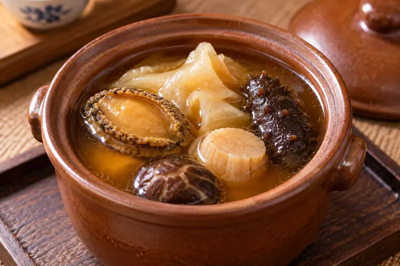 AI illustration: An individual crock of rich seafood soup with abalone and sea cucumber.