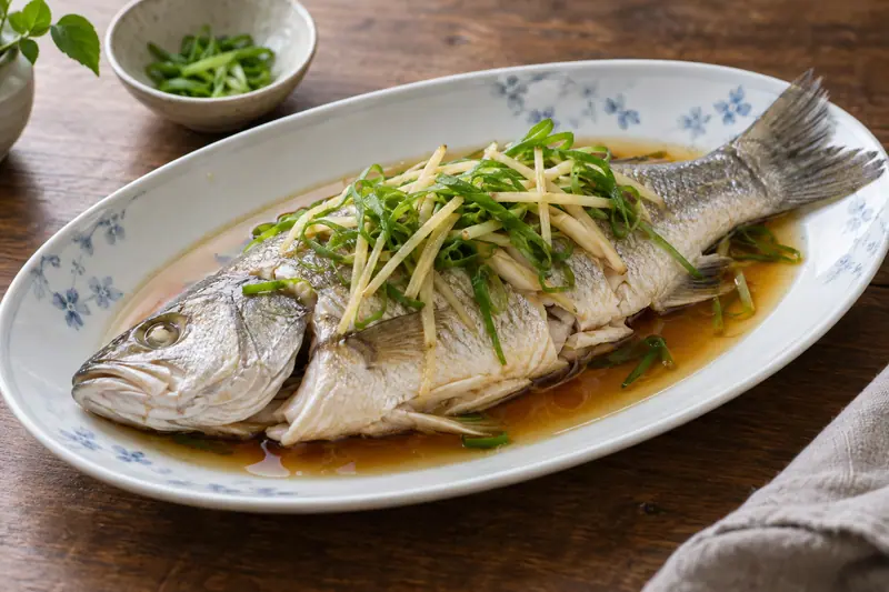 AI illustration: A cooked whole silver-skinned fish lying on an oval porcelain plate.