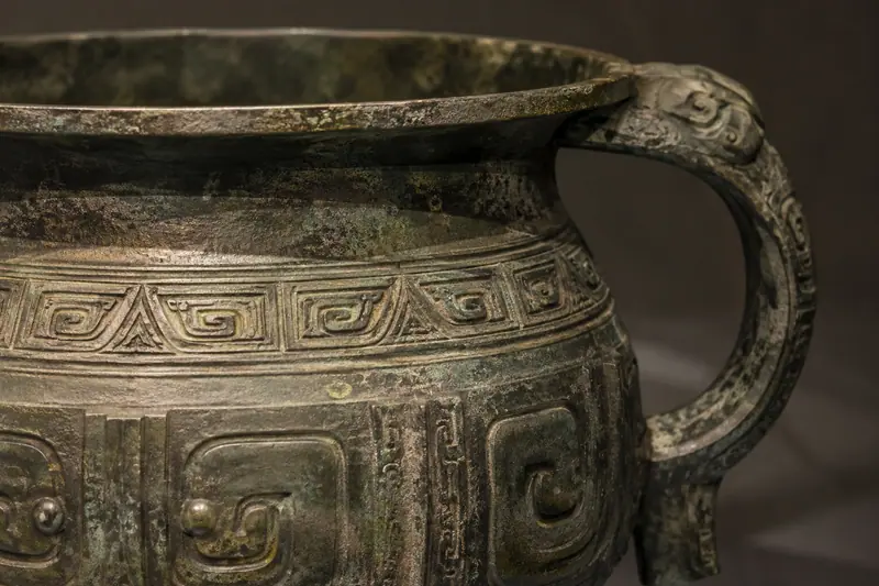 AI illustration: AI illustration: bronze vessel; generic detail, not a photograph of this place.