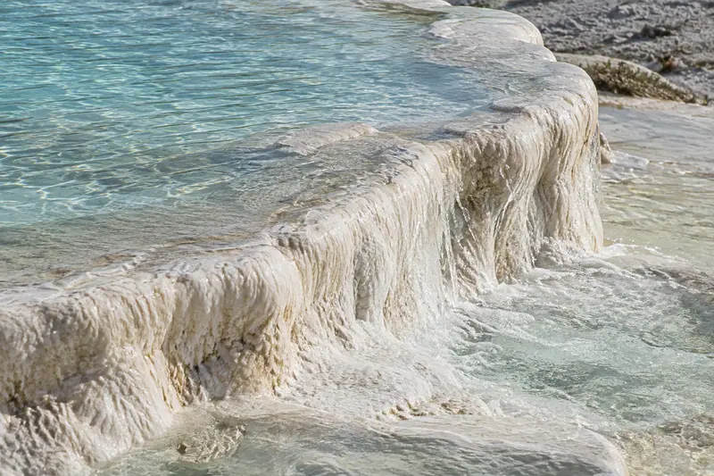 AI illustration: AI illustration: limestone travertine; generic detail, not a photograph of this place.