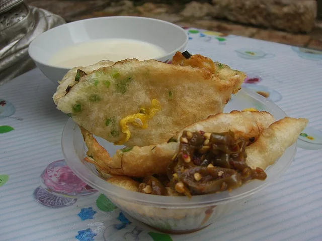 Lijiang baba bread opened to reveal its filling.