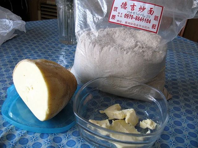Roasted barley flour and butter used for tsampa, before being mixed at the table.