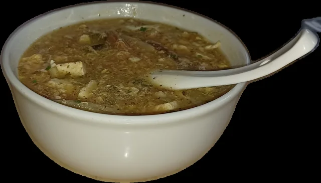 A homemade presentation of Sister Song's fish soup; the source recipe uses salmon.