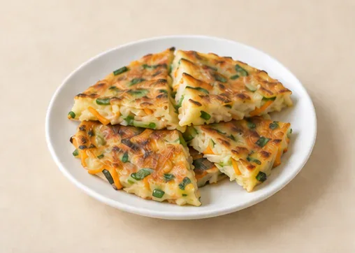 Xinghua Pan-Fried Rice Cakes (兴化煎粿): Pumpkin and chive flecks inside pan-fried rice-cake wedges show the selected Putian preparation. AI dish illustration.