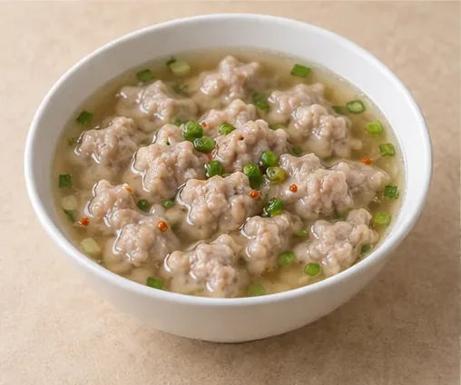 Zherong Beef Dumpling Soup (柘荣牛肉丸): Irregular small morsels distinguish this bowl from the round Yongding beef-ball panel. AI dish illustration.