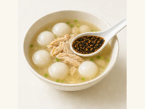 Xingyi chicken-filled rice dumplings · 兴义鸡肉汤圆 · AI dish illustration