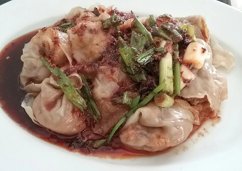 Homemade red-oil wontons in Fresno, California, following a Chinese cookbook recipe