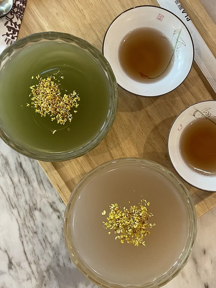 Prepared West Lake lotus-root starch with osmanthus topping in Hangzhou, August 2023