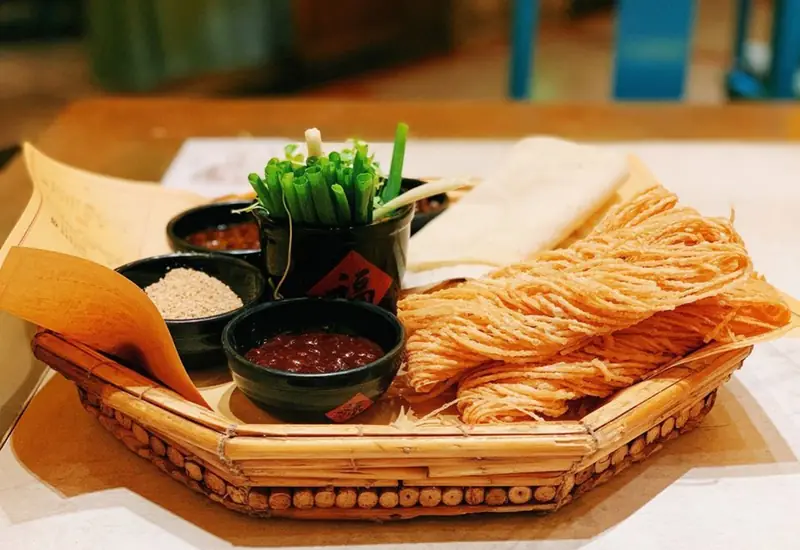Griddle Pancake Rolled with Fried Dough (烙馍卷馓子) — dish photograph