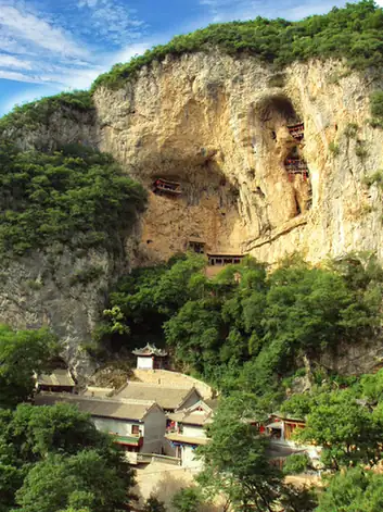 Long County (陇县) — representative view · 悬崖岩洞周围的山林和寺庙建筑