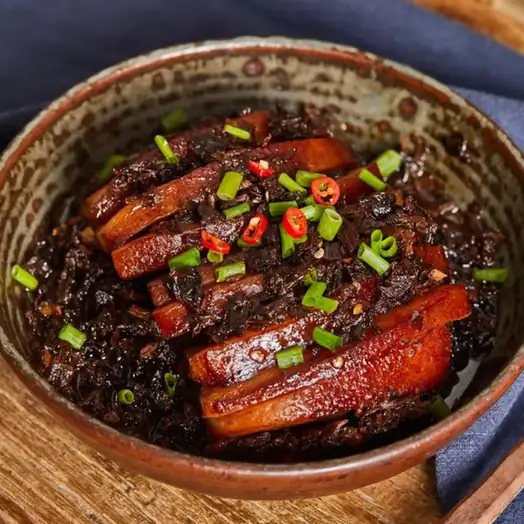 Pork Braised with Dried Salted Greens (干菜焖肉) — dish photograph