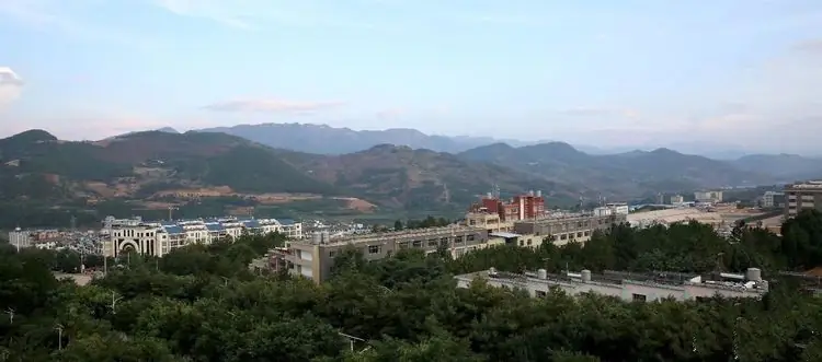 Yongde County (永德县) — representative view · 山地背景下的县城和村落