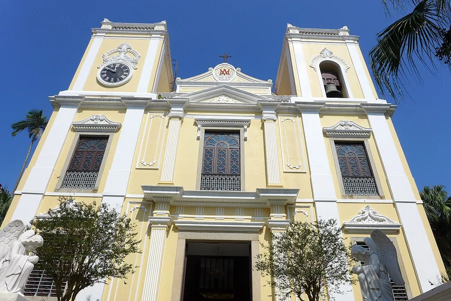 The yellow facade of St Lawrence's Church, Macau; 31 October 2023.