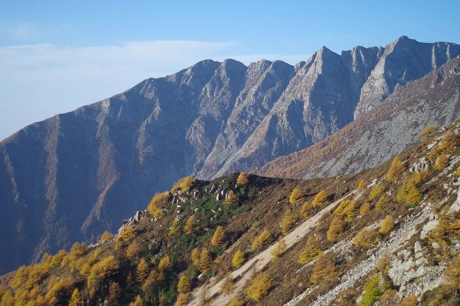 Rocky ridges and autumn-coloured slopes in Mount Taibai National Forest Park, Shaanxi; 4 October 2013.