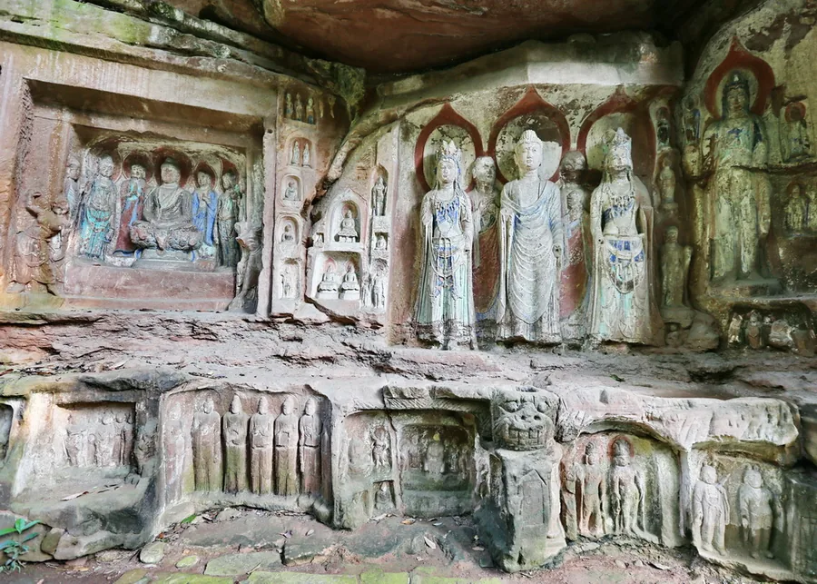 Buddhist rock-carved figures at the Feixiange Grottoes, Pujiang County, Sichuan; 15 August 2015.