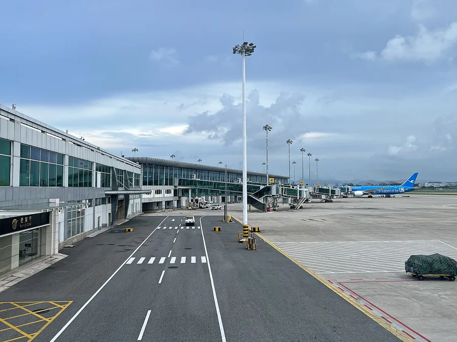 The airside terminal, apron and a parked aircraft at Fuzhou Changle International Airport, Fujian; 25 August 2023.