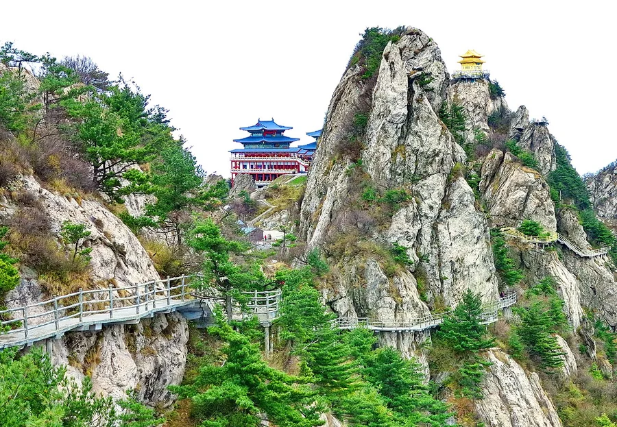 A cliffside walkway and summit buildings on Laojun Mountain in Henan, October 2013.