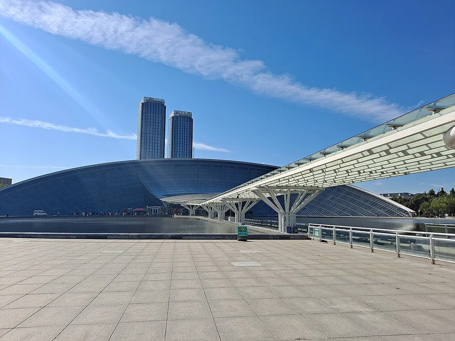 The curved roof and exterior approach of Tianjin Natural History Museum at the Cultural Center, September 2024.