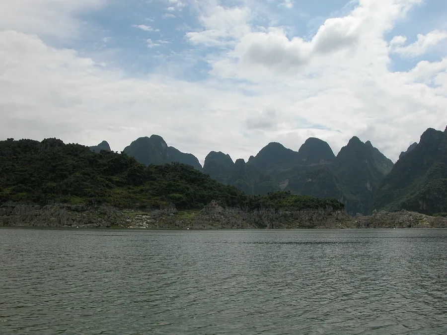 Wanfeng Lake with karst hills beyond its shore, July 2007.