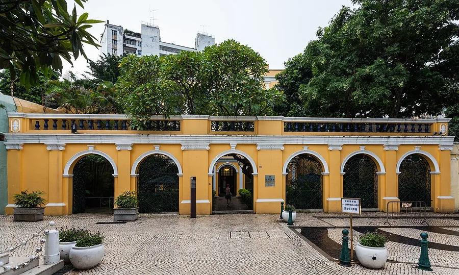 The yellow arched garden frontage at Sir Robert Ho Tung Library in Macau, August 2013.