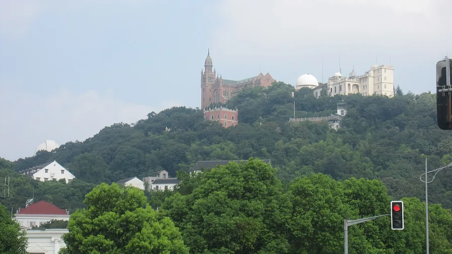 The basilica and historic observatory above wooded West Sheshan, Shanghai. Photographed on 21 August 2010.