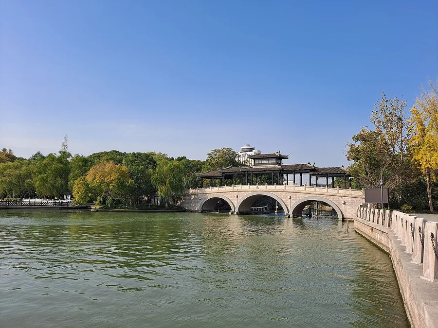 A waterside bridge and pavilion at South Lake in Jiaxing. Photographed on 13 November 2021.