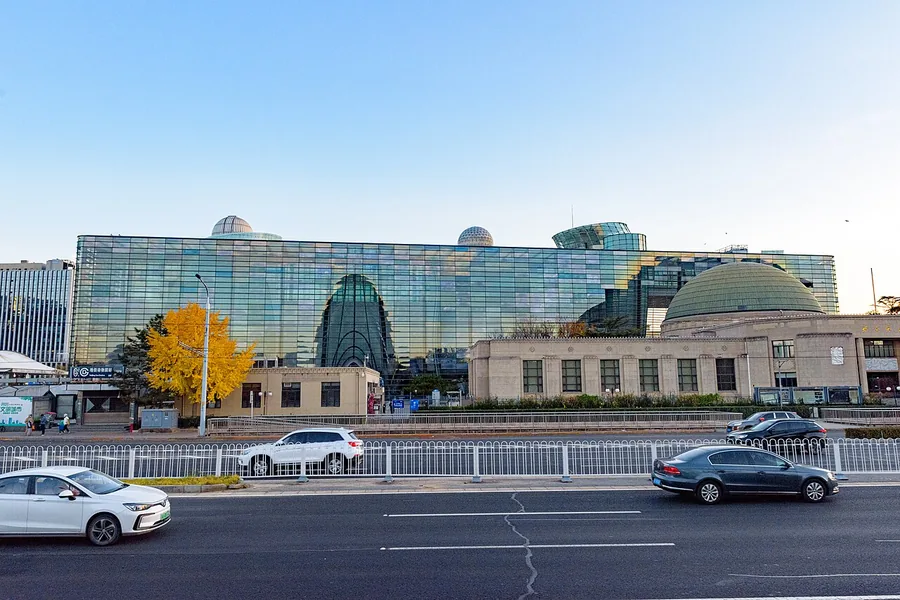 The old and new buildings of Beijing Planetarium, photographed from across the road.