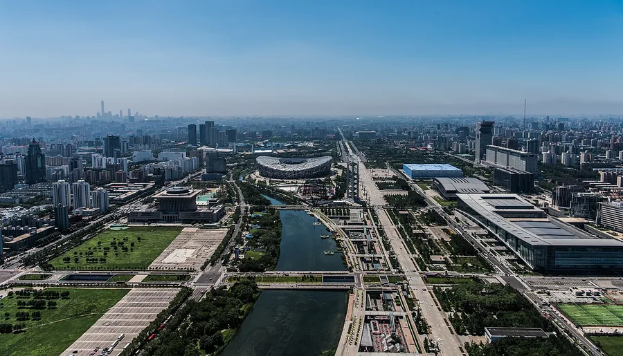 An elevated view across Beijing Olympic Green, including the Bird's Nest and Water Cube.