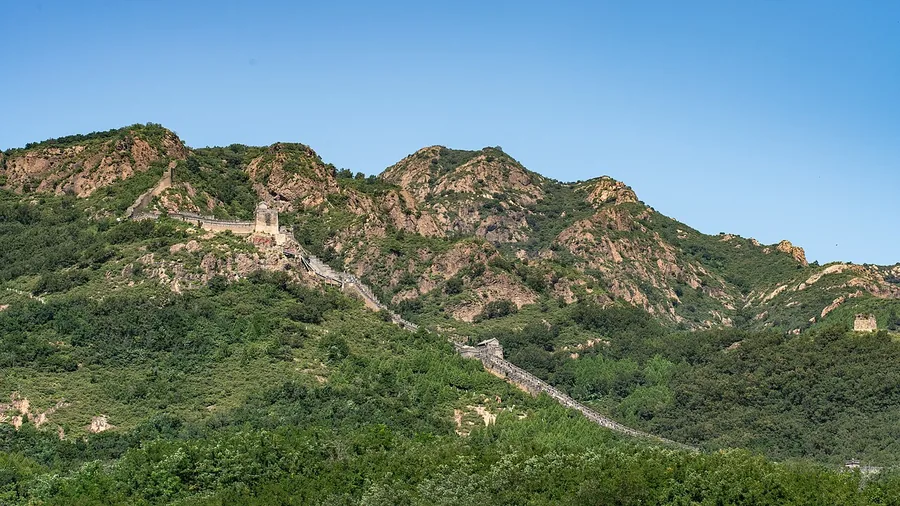 The Jiaoshan Great Wall following wooded and rocky ridges near Shanhaiguan. Photographed on 7 September 2025.