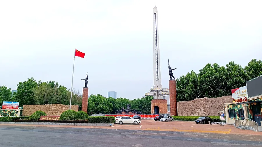 The memorial entrance and tall victory monument at the Pingjin Campaign Memorial Museum in Tianjin. Photographed on 19 June 2023.