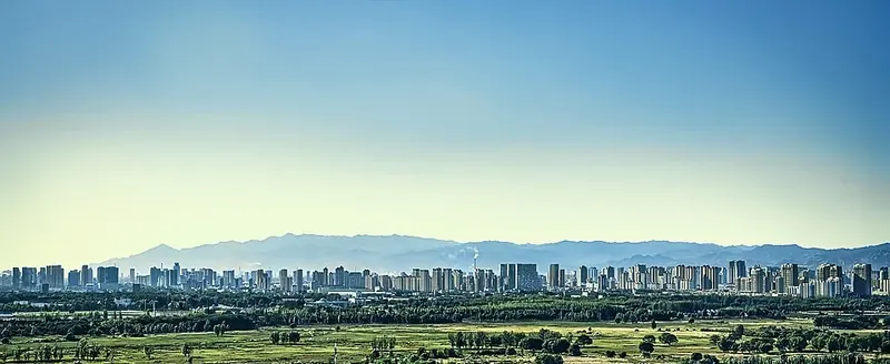 Baotou's skyline (包头), viewed across the greenery of Saihantala.