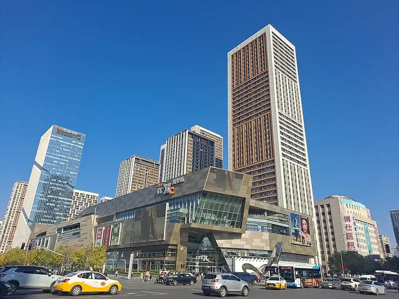 Tiexi Square in Shenyang (沈阳铁西广场), with commercial high-rises along the street.