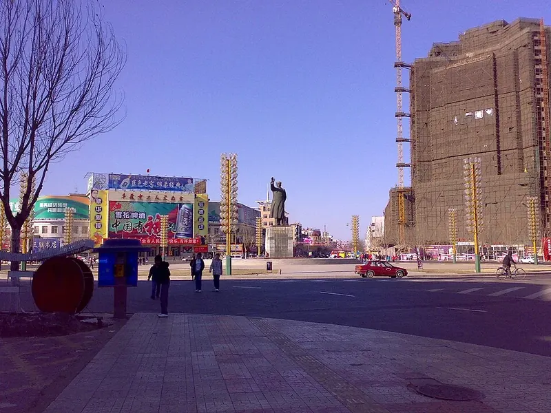 Jiefang Square in Fuxin (阜新解放广场), showing its monument and surrounding construction as photographed in February 2008.