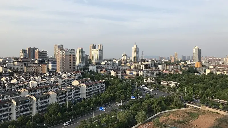 The urban skyline of Xuancheng (宣城), photographed in August 2011.