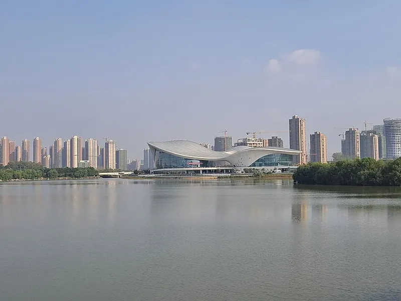 Jiujiang Culture and Art Center (九江文化艺术中心), seen across the water.