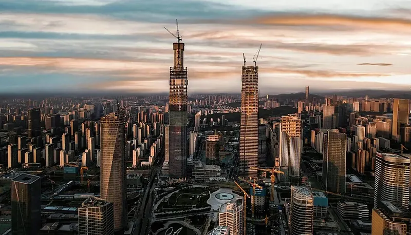 The skyline of Jinan's central business district (济南商务区), including construction visible at the time of the photograph.
