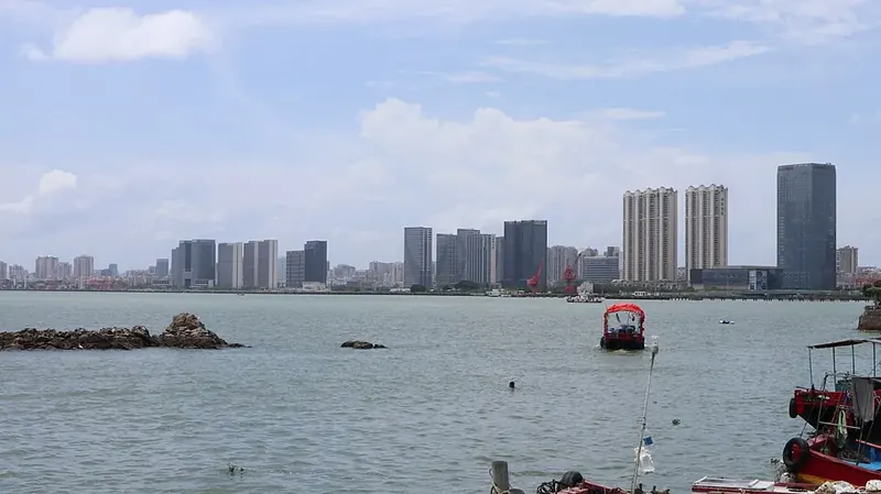 Shantou harbour and skyline (汕头), viewed from Double Island in June 2022.