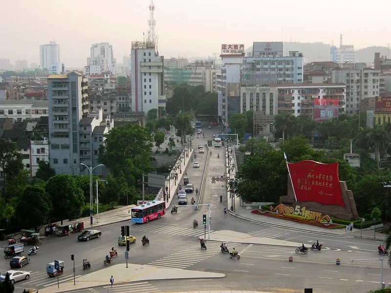 City street and bridge at dusk in Youjiang District, Baise