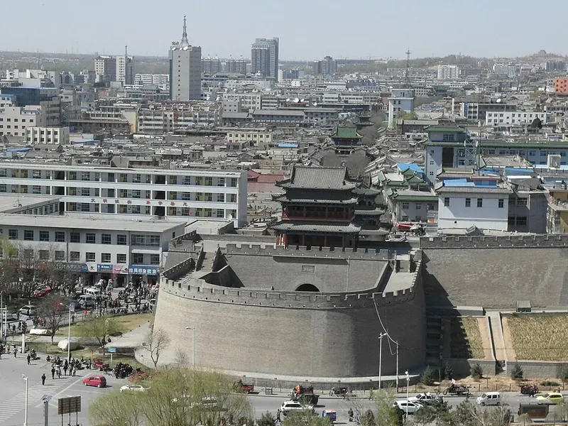 The historic gate tower and urban streetscape of Yulin old town in Yuyang District. Photo: 2010-05-14 16:00:23.