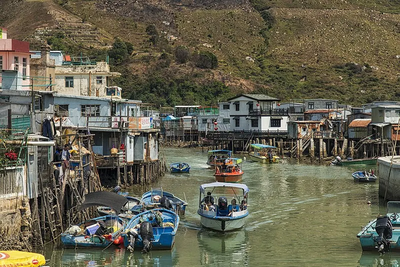 Stilt houses and boats along a Tai O waterway.