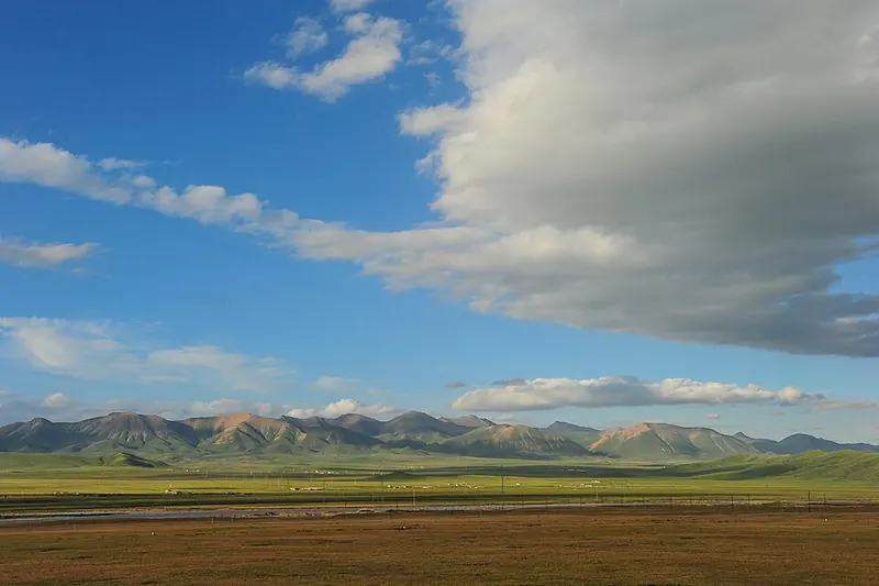 Fields and mountain scenery in Qilian County, Qinghai.