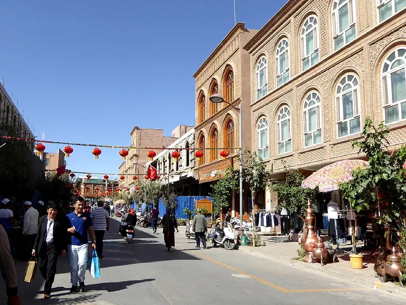 The shopping street and traditional building fronts of Kashgar old town. Source date: 11 November 2015 (original upload date).
