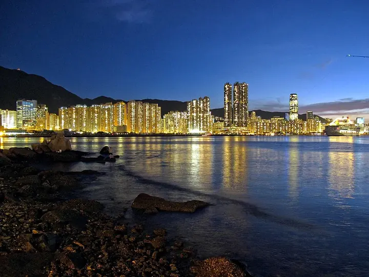 The Island East waterfront at night in Hong Kong's Eastern District.