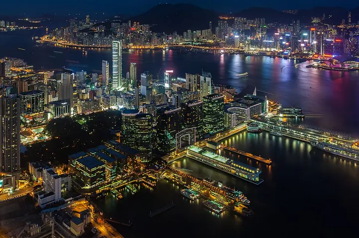 Tsim Sha Tsui’s Harbour City waterfront at night, viewed from Sky100 in 2013 · 尖沙咀海港城