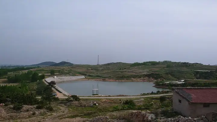 Fields and an irrigation pond in Donggang District, Rizhao. Photo: Taken on 26 May 2010.
