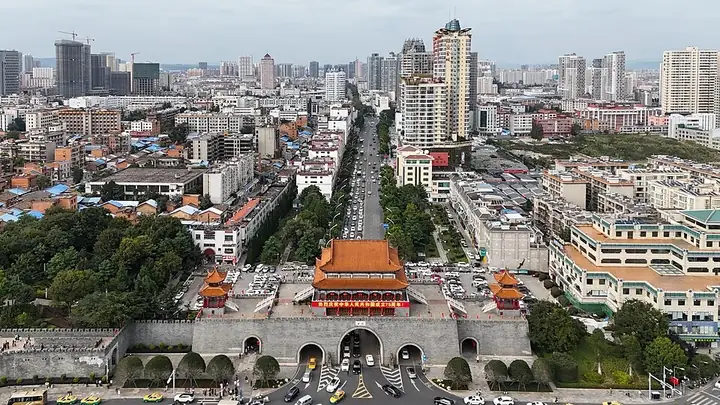 Aerial view of Qujing's skyline and the South City Gate landmark