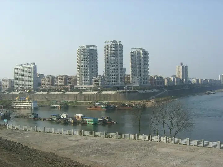 The urban waterfront at the meeting of the Fu and Jialing rivers in Hechuan District.