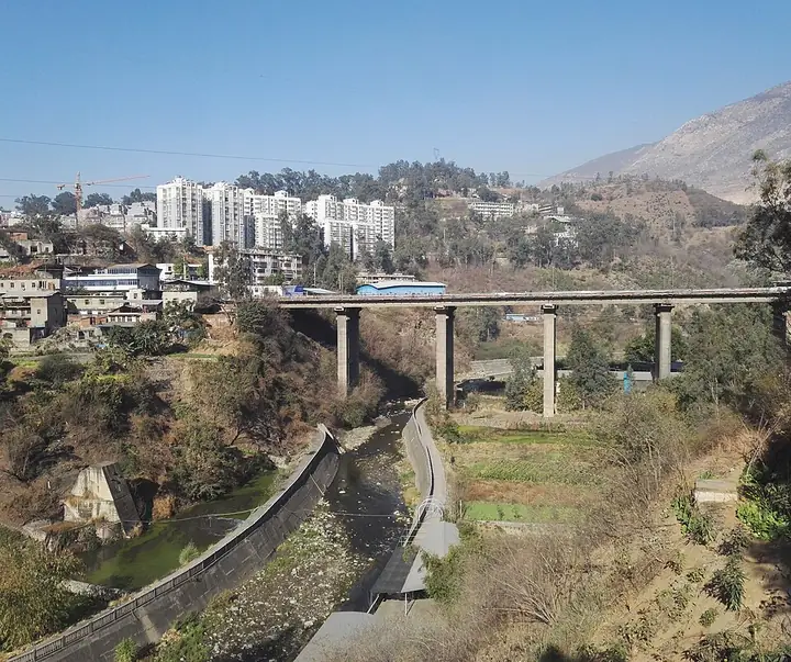The Baguan River and a bridge near Hemenkou in Xi District, Panzhihua.