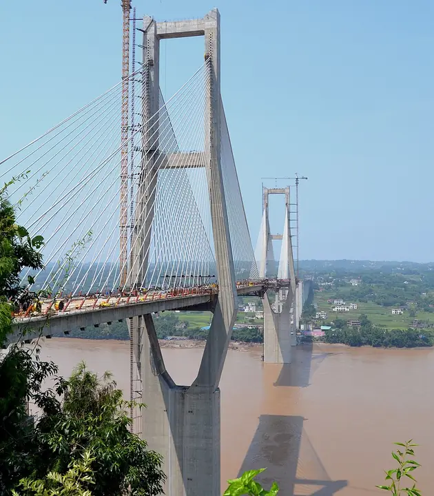 The Hejiang Yangtze River bridge crossing during construction in Hejiang County.
