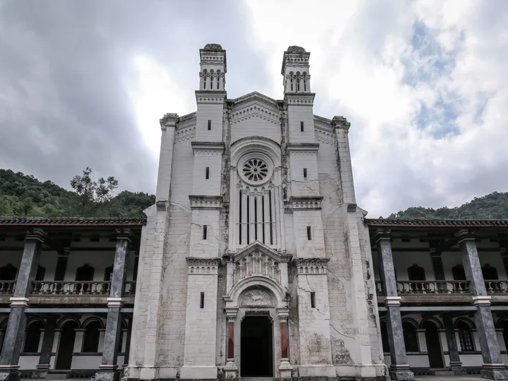 Twin-towered Gothic church façade of the Bailu Annunciation Seminary